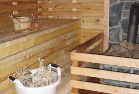 Sauna with cold water barrels